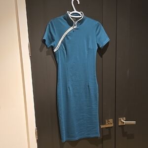 Elegant Teal Dress with White Trim